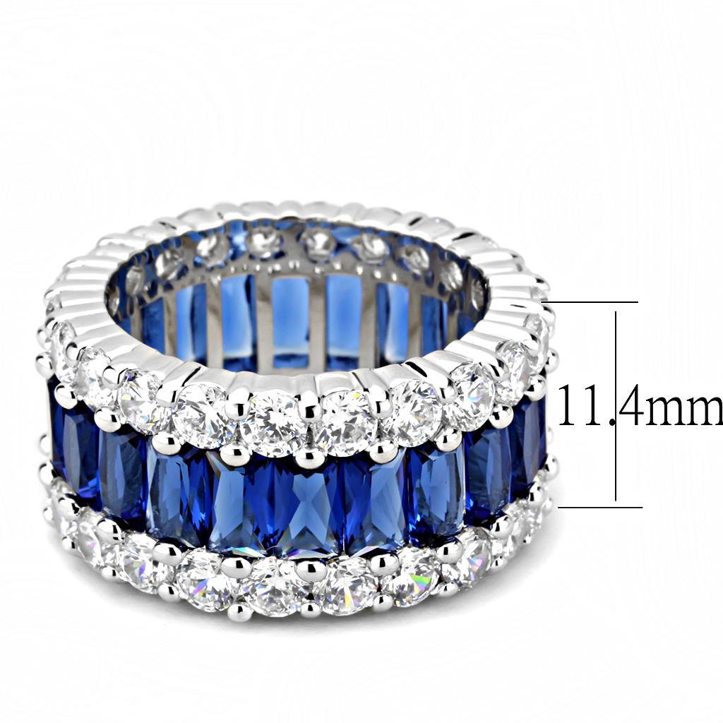 A beautiful rhodium brass ring featuring a synthetic Montana stone, showcasing its elegant design and shiny finish.