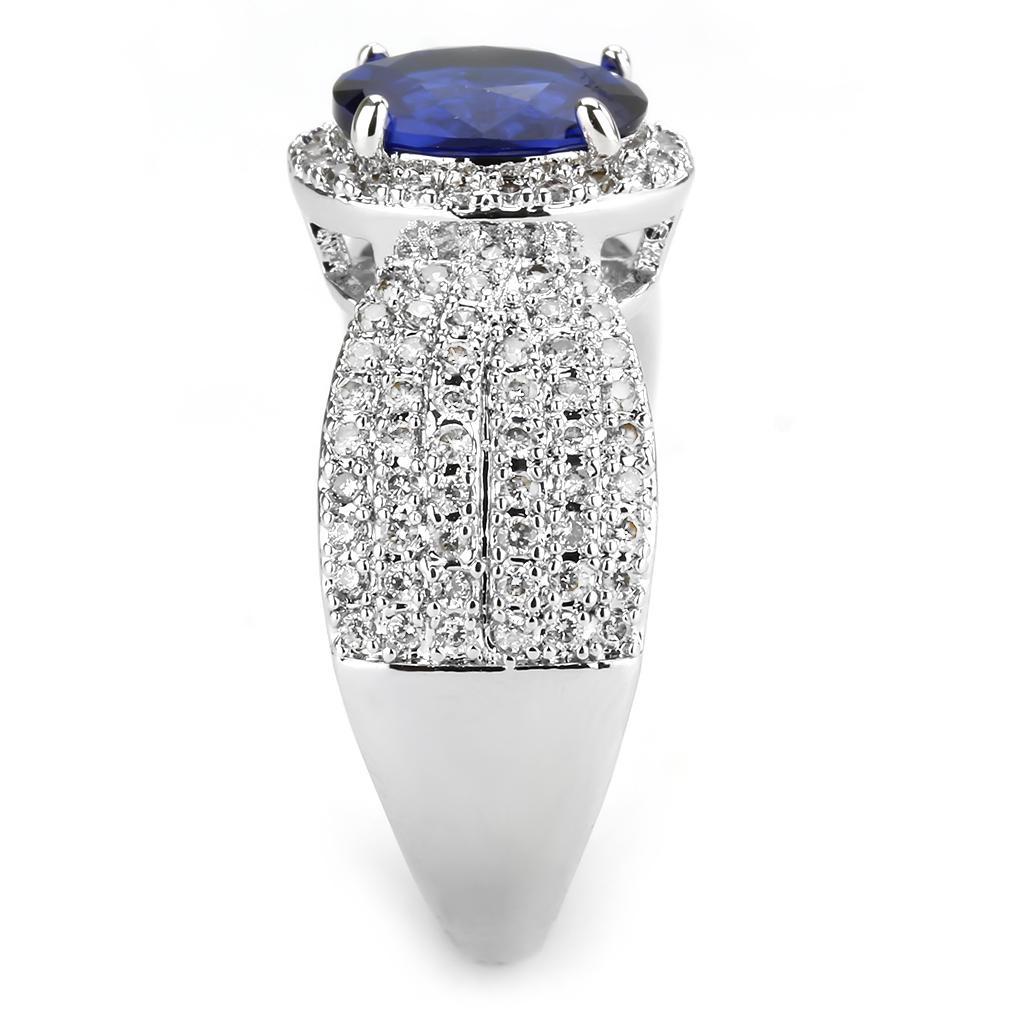 3W1563 Rhodium Brass Ring featuring a London Blue Synthetic Spinel, showcasing its elegant design and vibrant color.