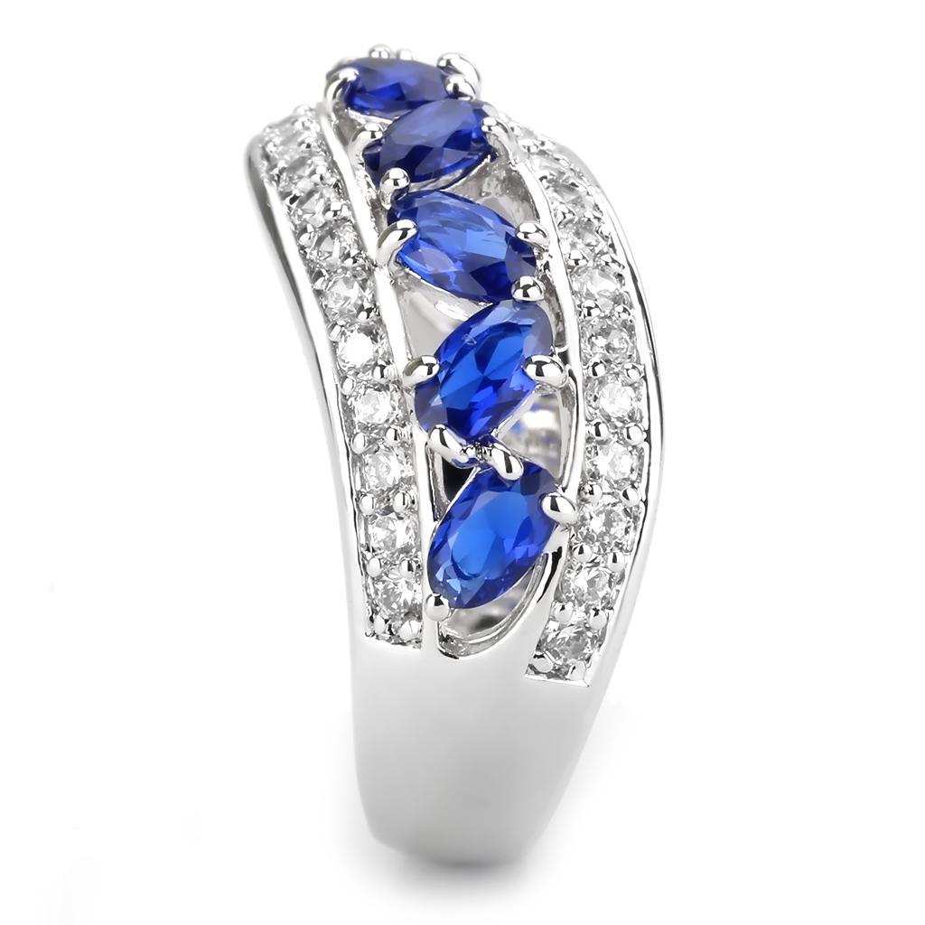 3W1569 Rhodium Brass Ring featuring a London Blue Synthetic Spinel, showcasing its elegant design and vibrant color.