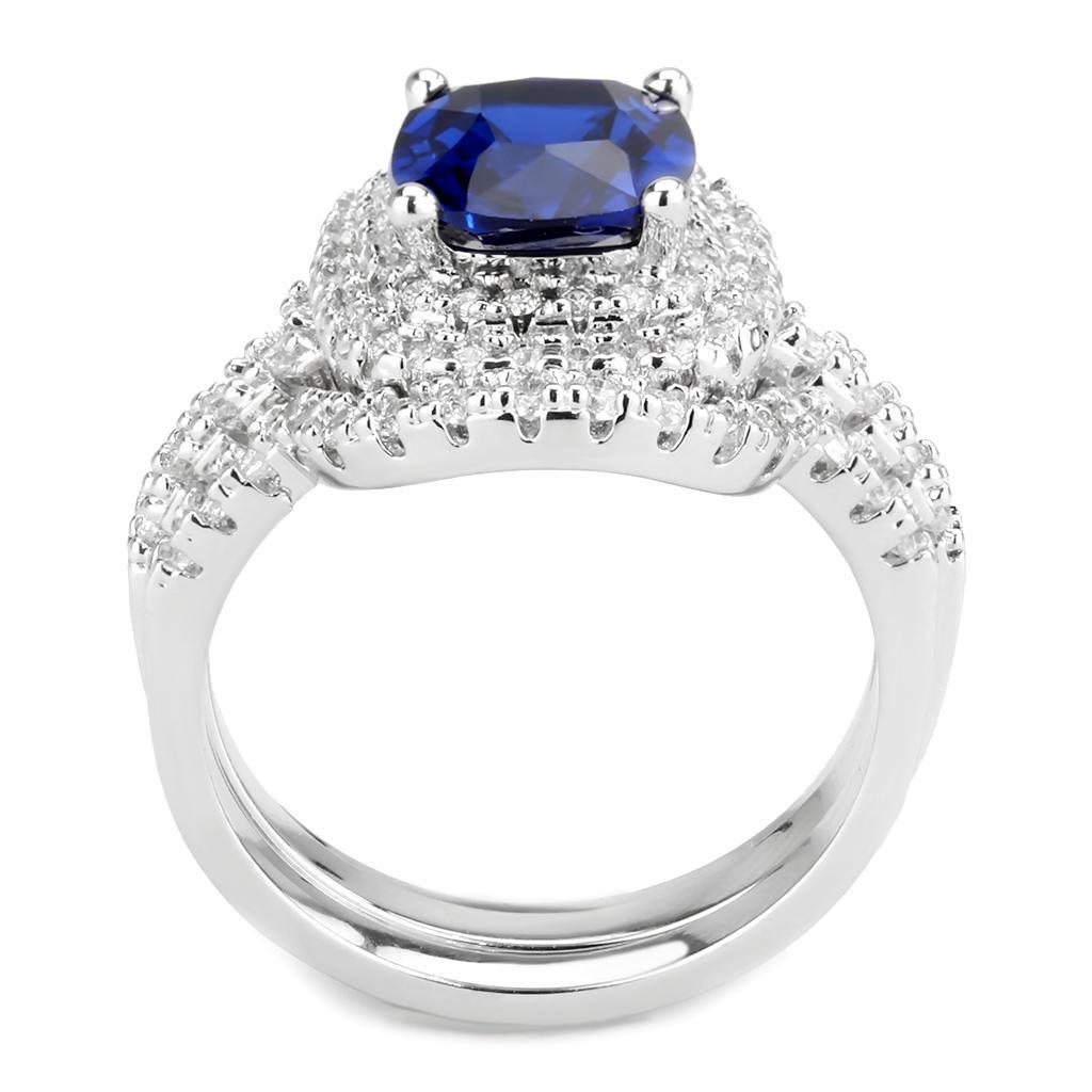 3W1599 Rhodium Brass Ring featuring a vibrant London Blue Synthetic Spinel, showcasing its elegant design and quality craftsmanship.