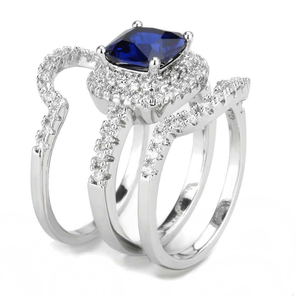 3W1599 Rhodium Brass Ring featuring a vibrant London Blue Synthetic Spinel, showcasing its elegant design and quality craftsmanship.