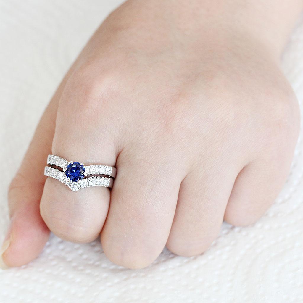 3W1596 Rhodium Brass Ring featuring a stunning AAA Grade London Blue CZ stone, showcasing elegance and craftsmanship.