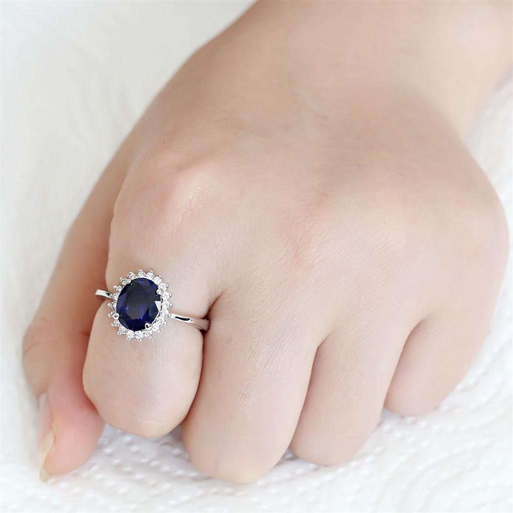 3W1602 Rhodium Brass Ring featuring a large AAA Grade CZ stone in London Blue, showcasing its elegant design and luxurious finish.