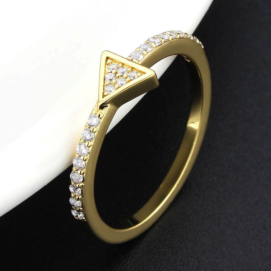 3W1615 Flash Gold Brass Ring featuring AAA Grade CZ in Clear, showcasing its elegant design and sparkling center stone.