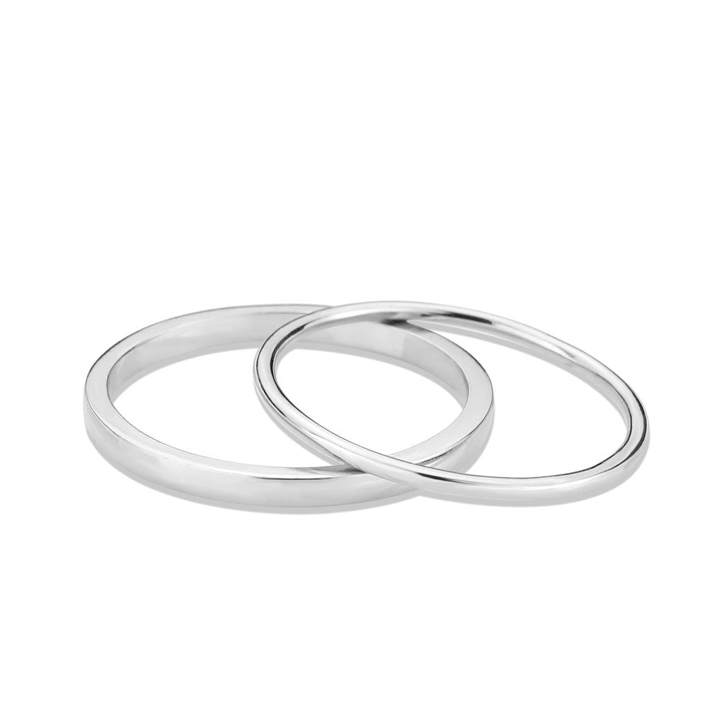 3W1625 Rhodium Brass Ring with a sleek, minimalist design, featuring a shiny rhodium finish and no center stone, perfect for elegant styling.