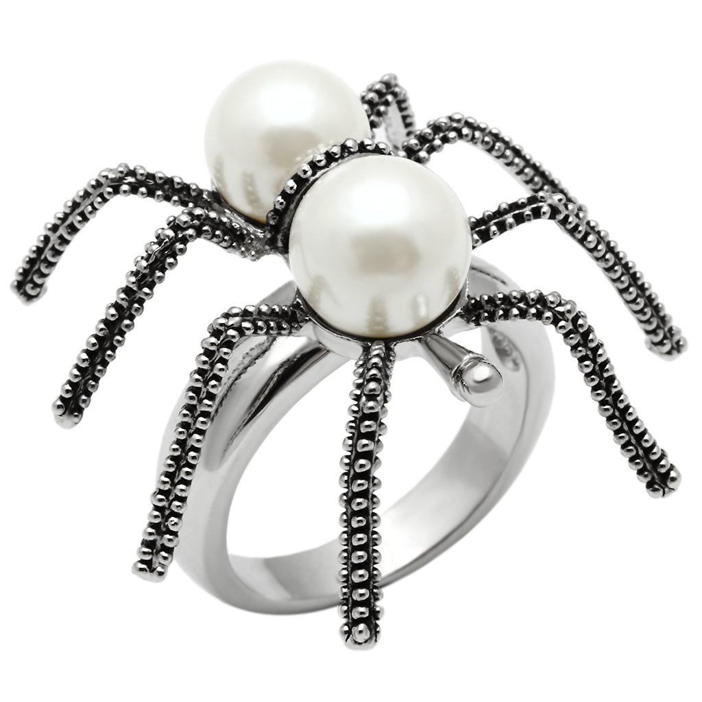 Rhodium brass ring featuring a synthetic white pearl, elegantly designed for stylish wear.