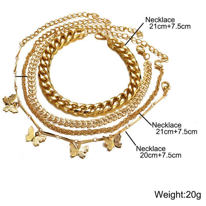 A luxurious 4 Piece Chain and Butterfly Bracelet Set, featuring intricate designs in 18K gold plating, showcasing elegance and style.