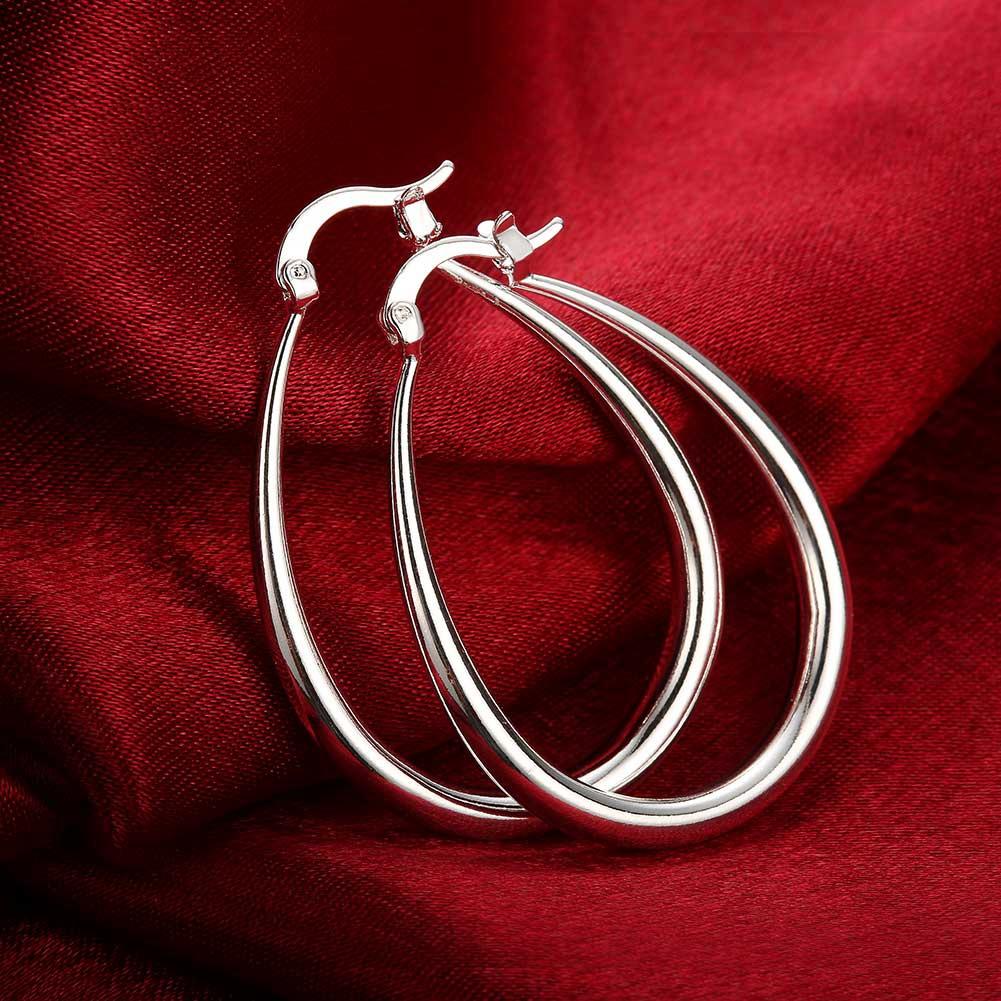 A pair of elegant 40mm French Lock Hoop Earrings in 18K white gold plating, showcasing a shiny finish and a comfortable design.