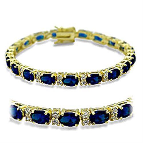 Gold brass bracelet featuring synthetic spinel in sapphire color, elegantly designed with a luxurious gold finish.