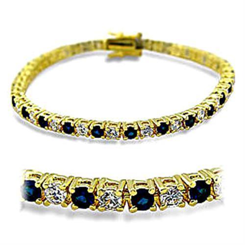 Gold brass bracelet featuring a synthetic spinel stone in sapphire color, elegantly designed for stylish wear.