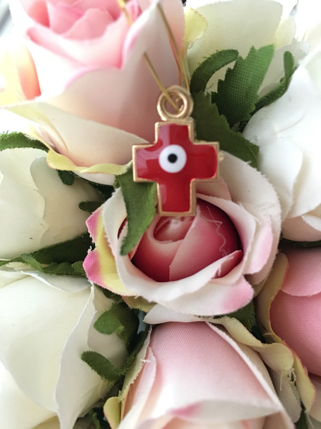 Set of 5 cross evil eye safety pins in red and turquoise, featuring gold plating and big enamel evil eye charms for baby protection.