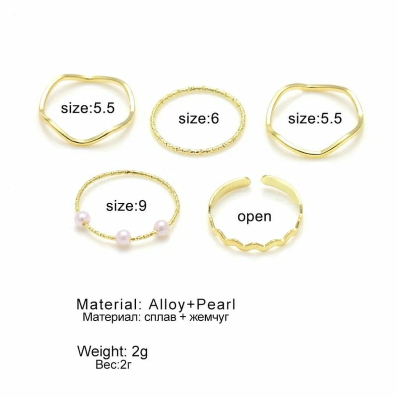 5 Piece Slim Silver Bohemian Pearl Tribal Midi Stackable Ring Set displayed elegantly, showcasing their minimalist design and high-quality finish.