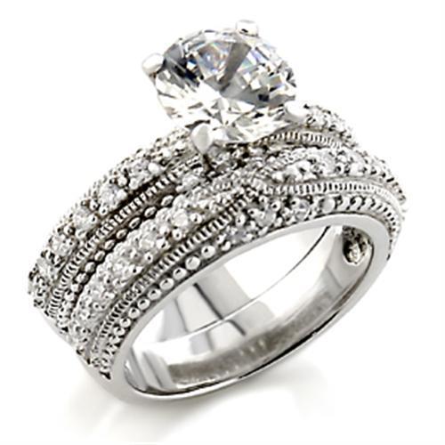 5X024 Rhodium Brass Ring featuring a clear AAA Grade CZ stone, showcasing its elegant design and shiny finish.