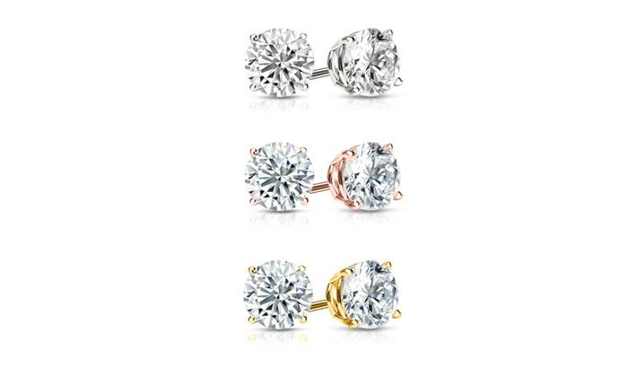 A set of three pairs of 18K gold plated stud earrings adorned with sparkling crystals, showcasing elegance and style.