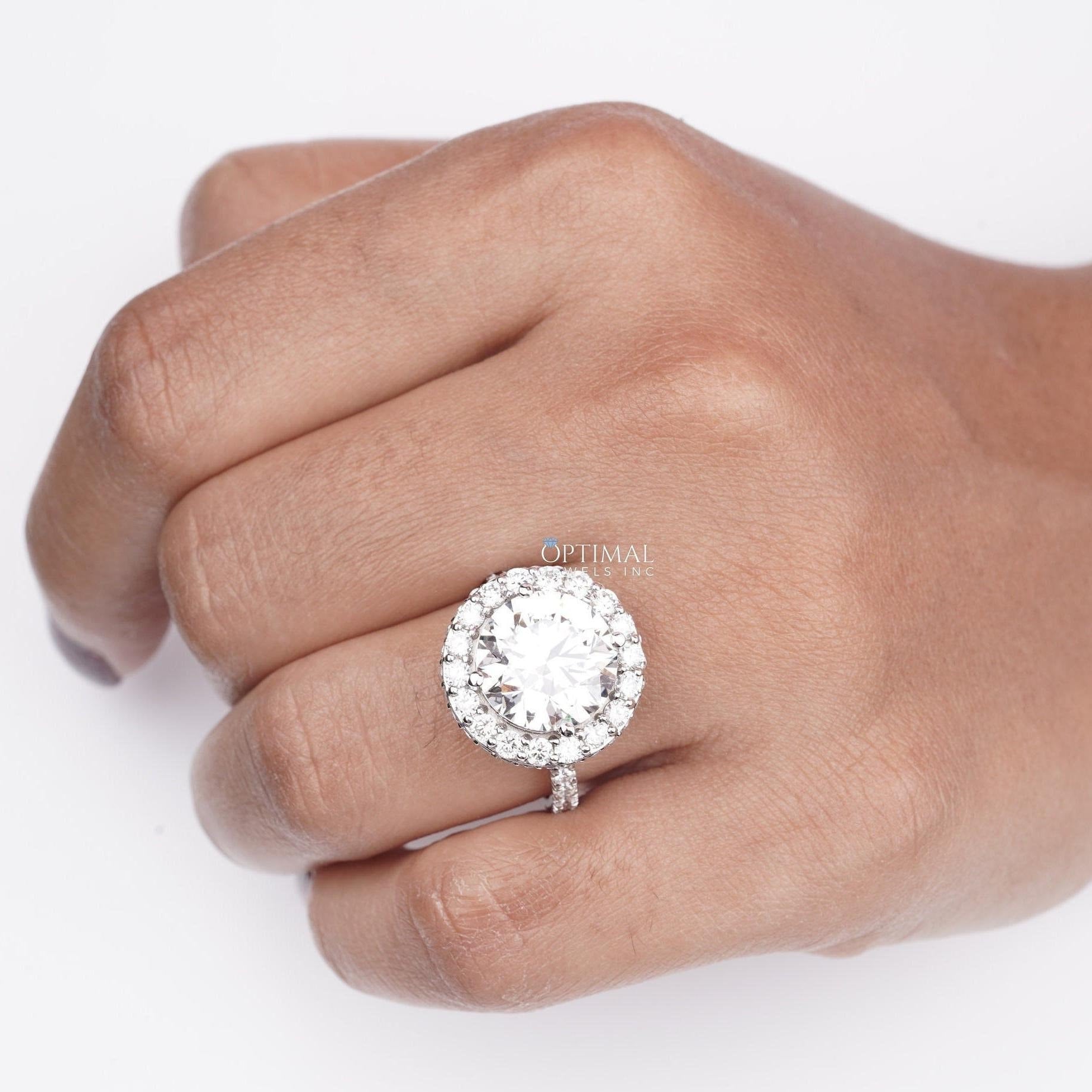 6.00 CTW Gigantic Halo Engagement Ring featuring a round cut lab-grown diamond set in white gold, showcasing exquisite craftsmanship.