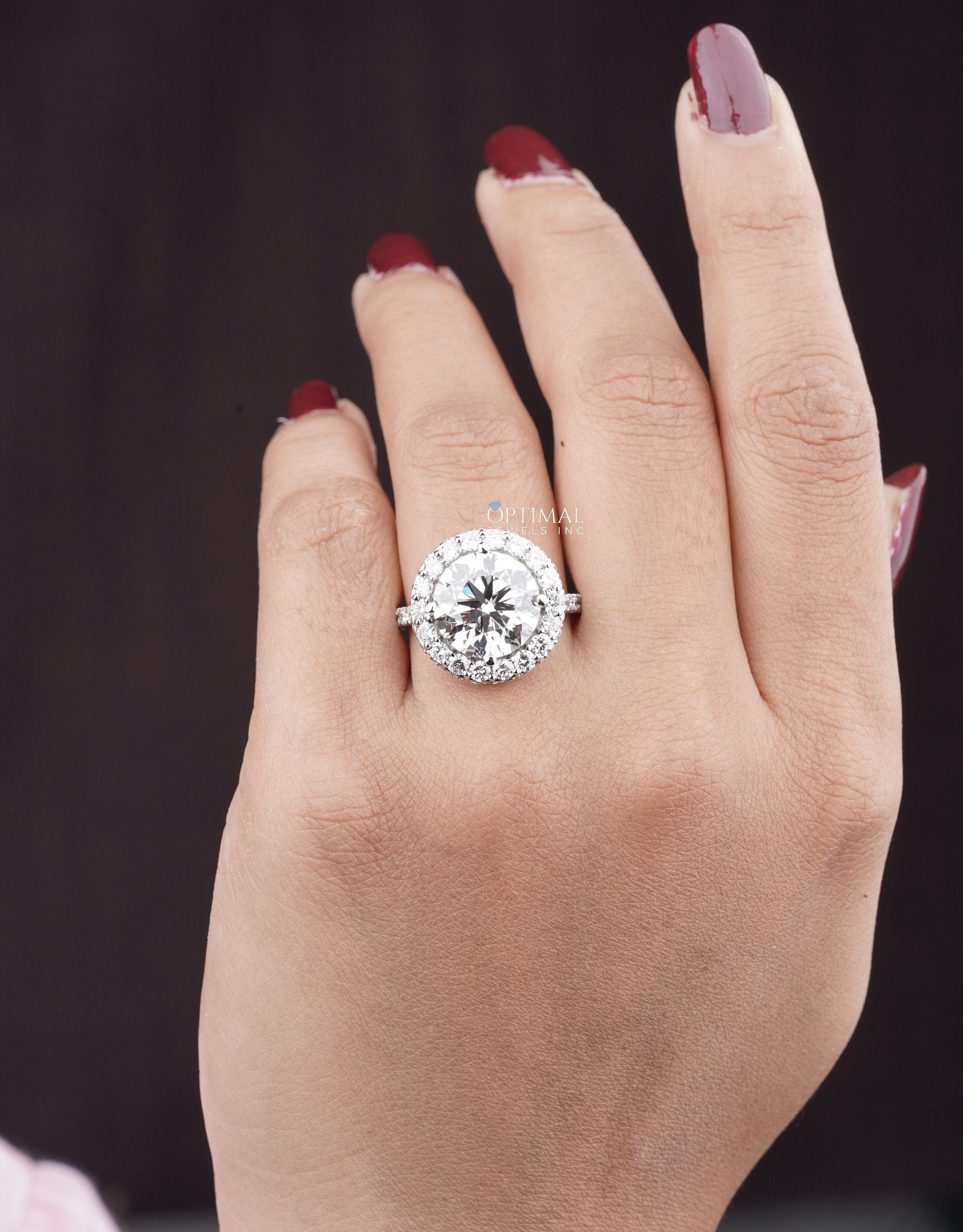 6.00 CTW Gigantic Halo Engagement Ring featuring a round cut lab-grown diamond set in white gold, showcasing exquisite craftsmanship.