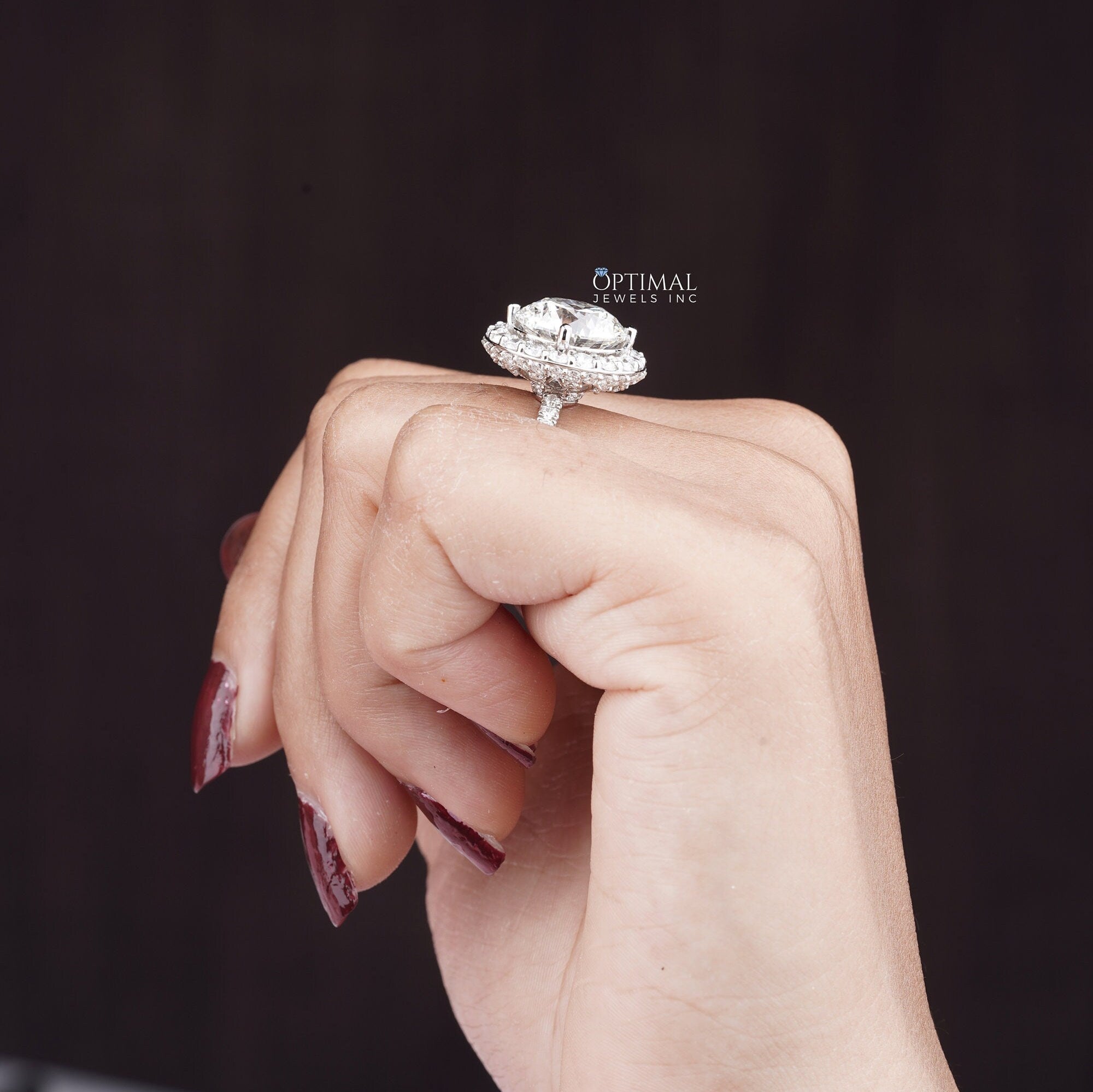 6.00 CTW Gigantic Halo Engagement Ring featuring a round cut lab-grown diamond set in white gold, showcasing exquisite craftsmanship.