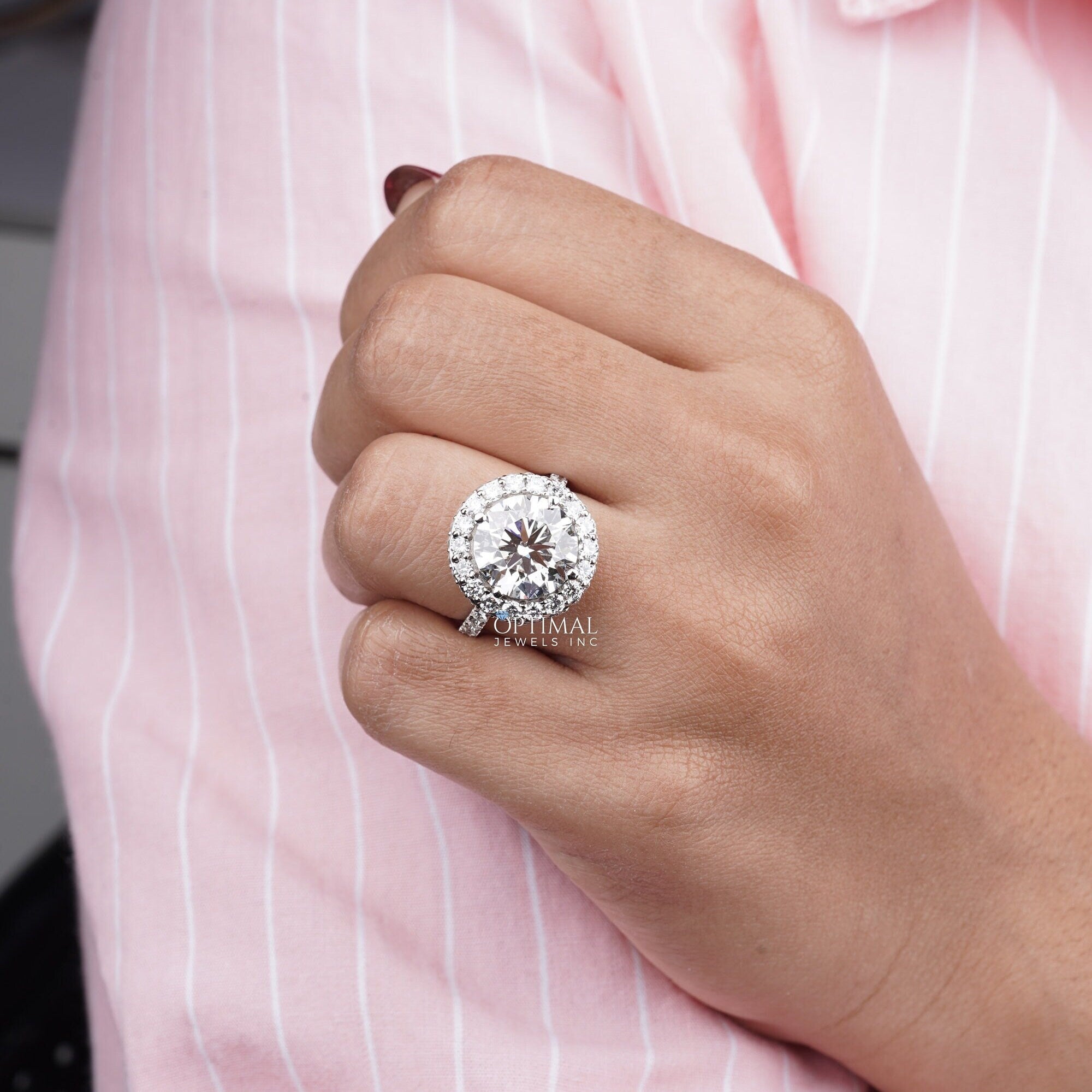 6.00 CTW Gigantic Halo Engagement Ring featuring a round cut lab-grown diamond set in white gold, showcasing exquisite craftsmanship.