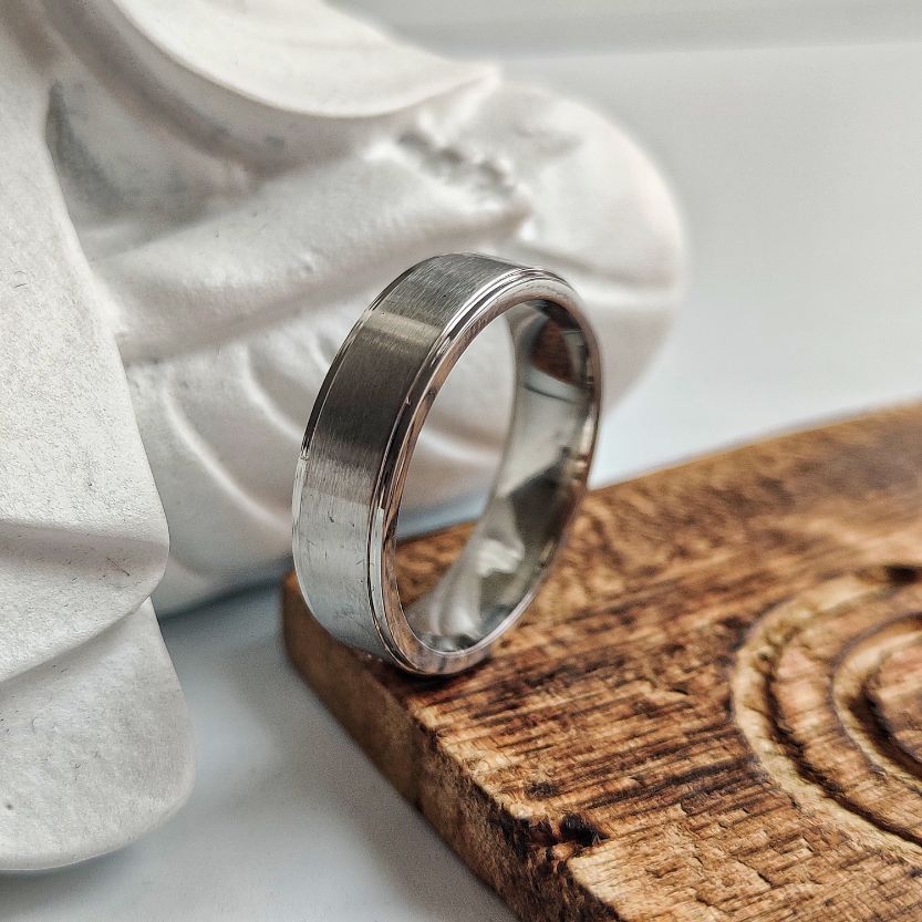 6mm Mens Silver Tungsten Engagement Wedding Band Ring showcasing its sleek design and classic silver finish.