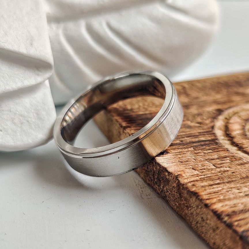 6mm Mens Silver Tungsten Engagement Wedding Band Ring showcasing its sleek design and classic silver finish.