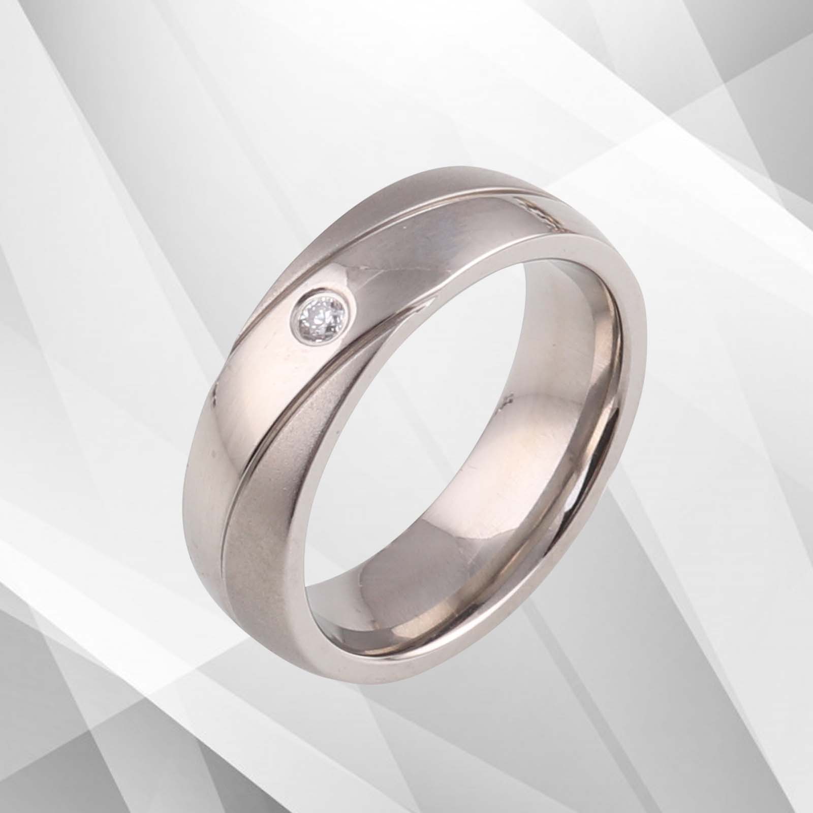 6mm wide titanium wedding ring with a brushed matt finish and sparkling 18Ct white gold plating, featuring a 0.35Ct CZ diamond.