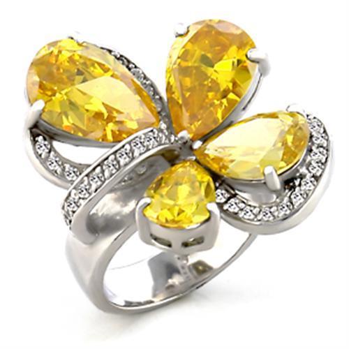 6X044 Rhodium Brass Ring featuring AAA Grade CZ in Topaz, showcasing its elegant design and brilliant shine.