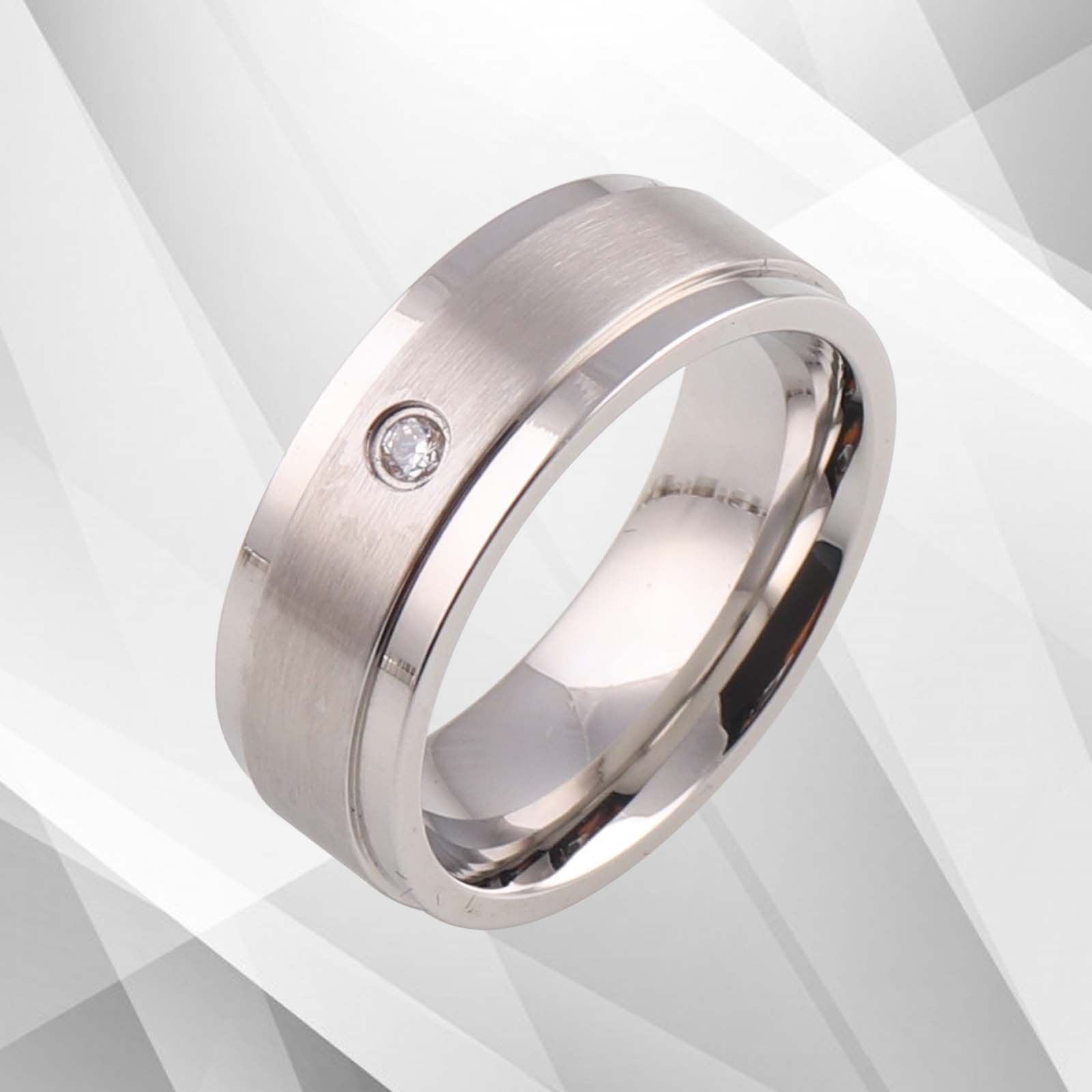 7mm Comfort Fit Titanium Wedding Band with 18Ct White Gold and 0.35Ct CZ Diamond, showcasing a brushed and sparkling finish.