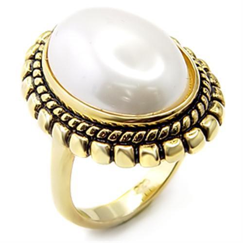 Elegant 7X232 Gold 925 Sterling Silver Ring featuring a synthetic white pearl centerpiece.