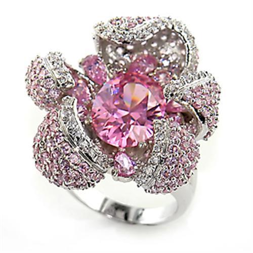 Rhodium brass ring featuring a large AAA grade cubic zirconia stone in rose color, showcasing its elegant design.
