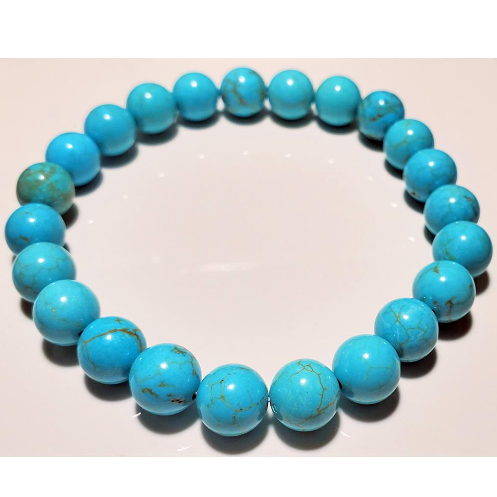 8mm blue howlite beaded elastic stretch bracelet with smooth finish, showcasing round beads and comfortable design.