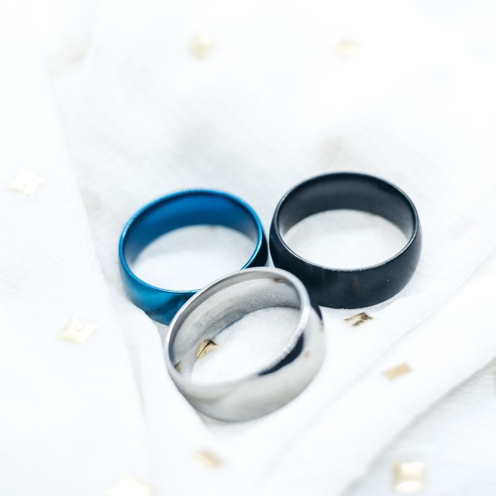 8mm Mens Tungsten Engagement Band Ring in blue, silver, and black, showcasing a sleek minimalist design.