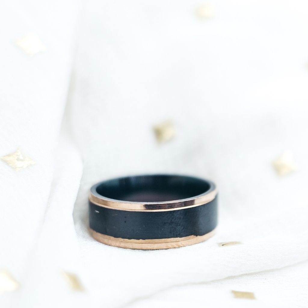 8mm wide black tungsten thick men's band ring with gothic design, showcasing a shiny stainless steel finish.