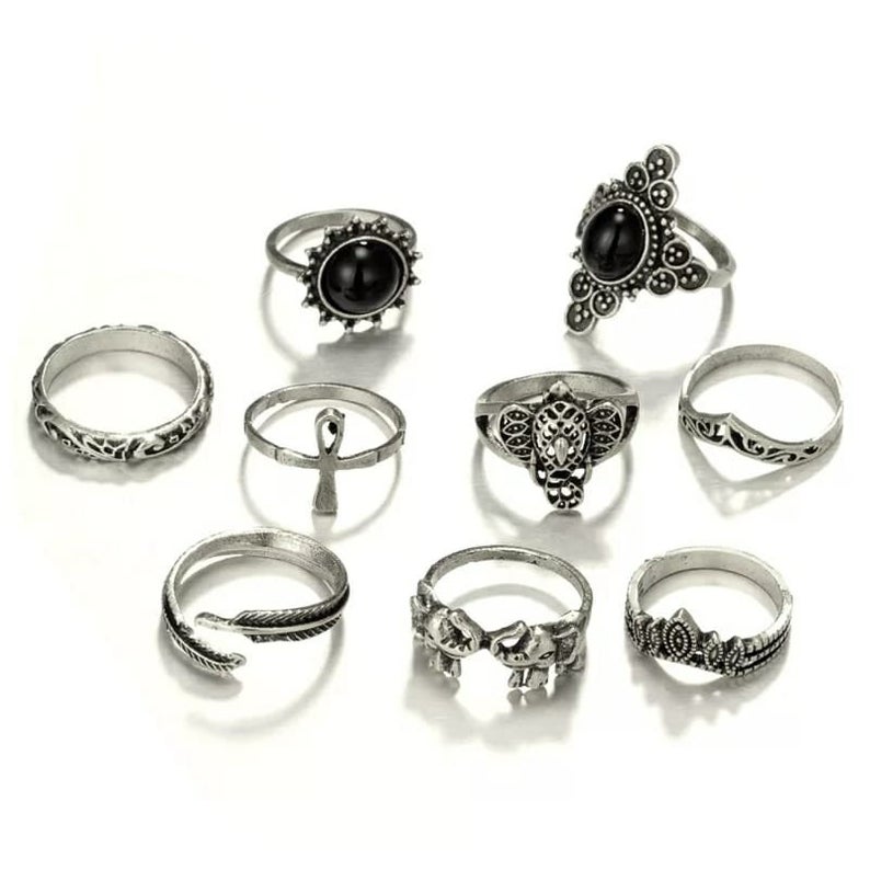 A stylish 9 piece bohemian stackable beach midi tribal vintage ring set featuring elegant silver rings with unique designs.