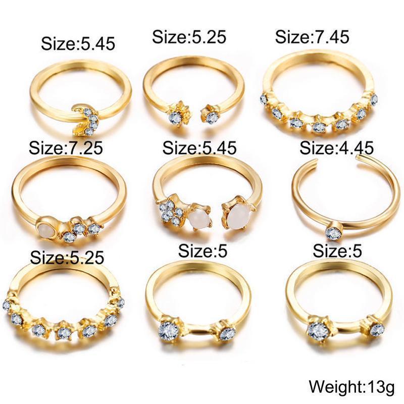 A stunning 9 piece celestial ring set featuring various gemstone crystals, elegantly plated in 18K gold, showcasing intricate designs.
