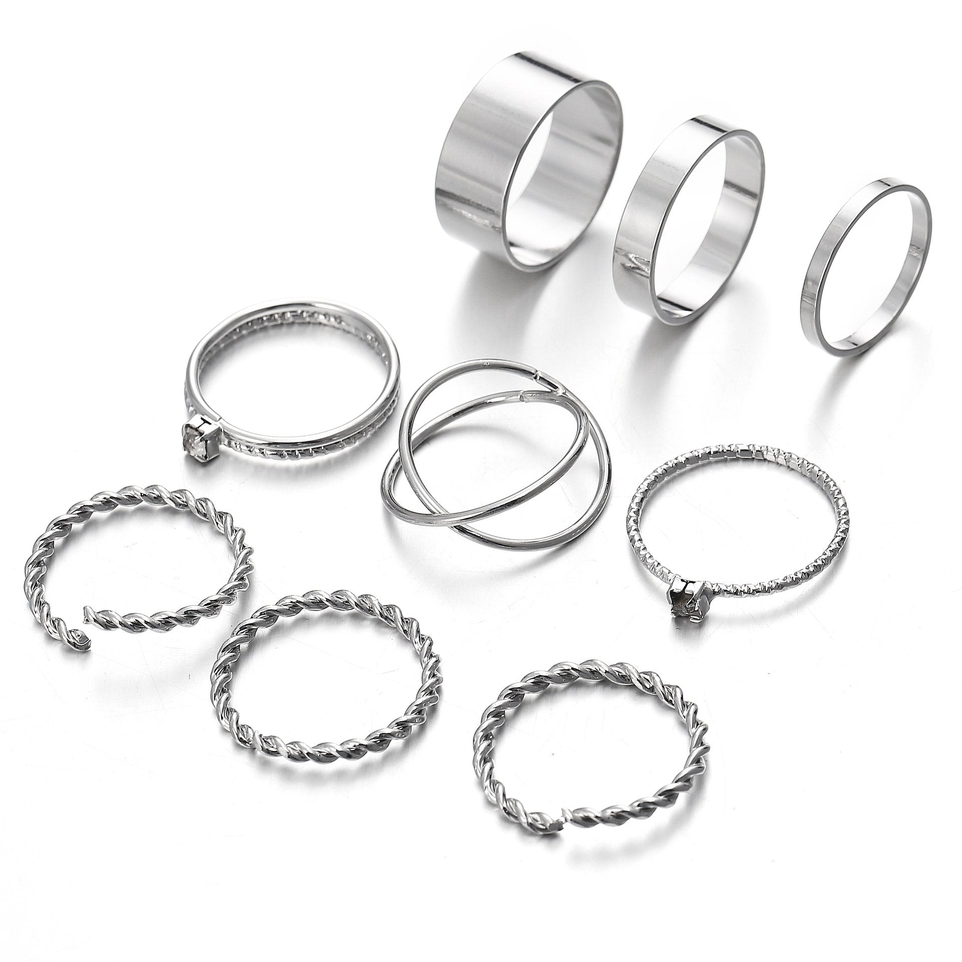 9 Piece Twist Geo Ring Set featuring elegant 18K white gold plating, showcasing unique twist designs.