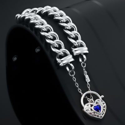 925 Sterling Silver Plated 12mm Euro Curb Chain Bracelet featuring a Dark Blue Filigree Locket, showcasing its elegant design and quality craftsmanship.