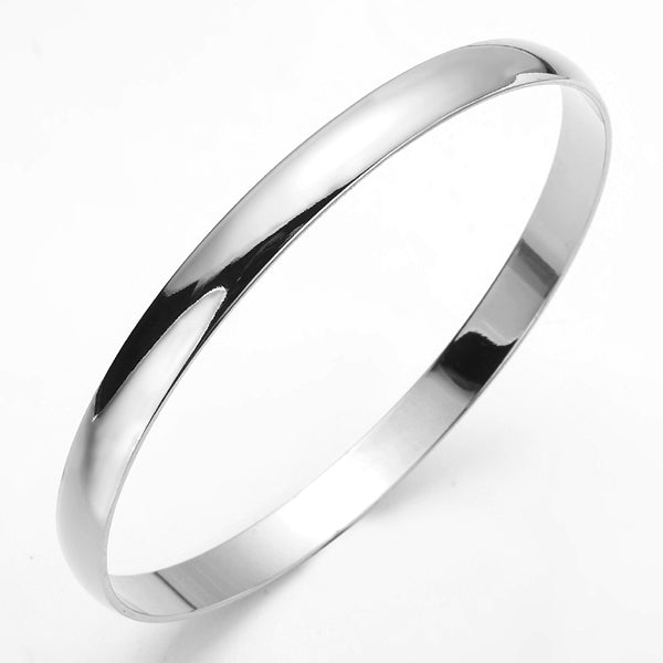 A sleek 925 Sterling Silver Plated bangle, 7mm wide, available in two sizes, elegantly designed for women.