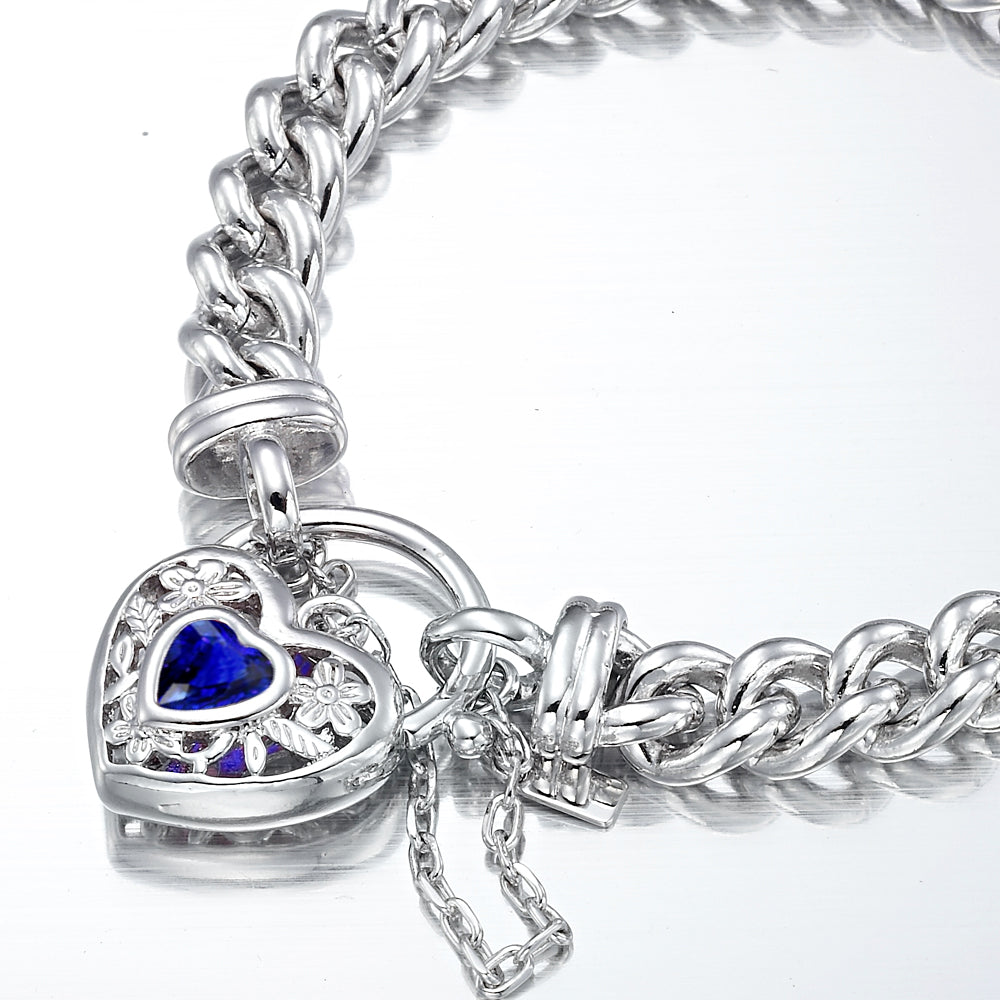 925 Sterling Silver Plated Euro Chain Bracelet featuring a dark blue filigree locket, showcasing its elegant design and quality craftsmanship.