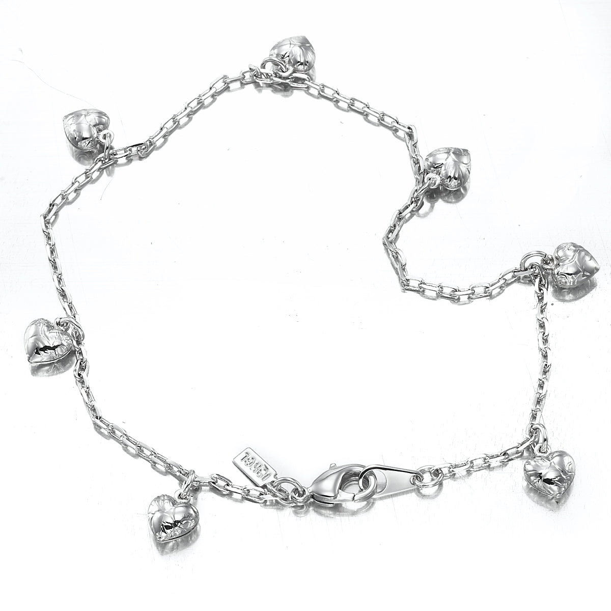 925 Sterling Silver Plated Heart Charm Anklet showcasing a delicate chain with heart charms, made in the USA.