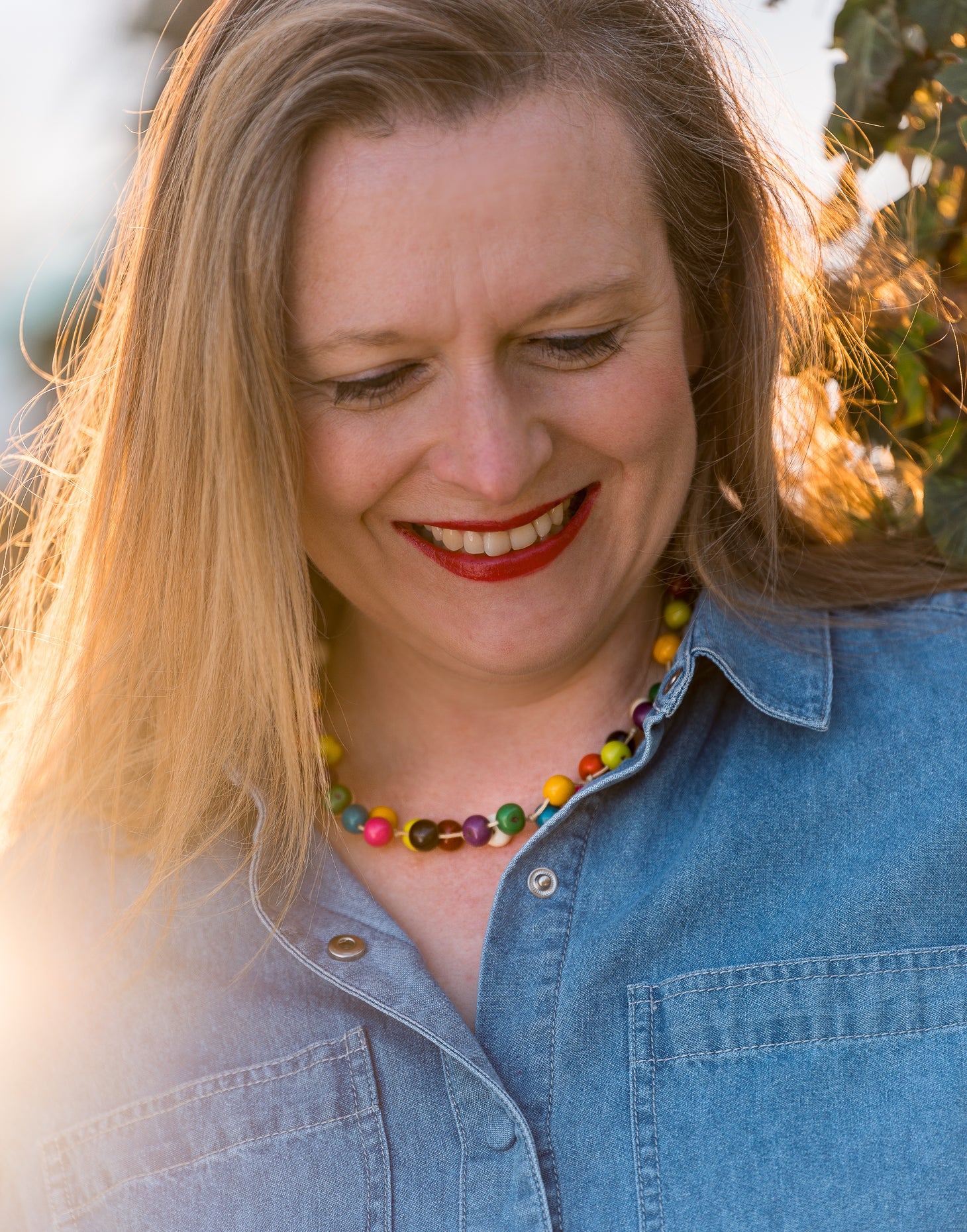 A colorful Acai Berry Short Necklace made from organic acai seeds, showcasing a delicate and lightweight design.