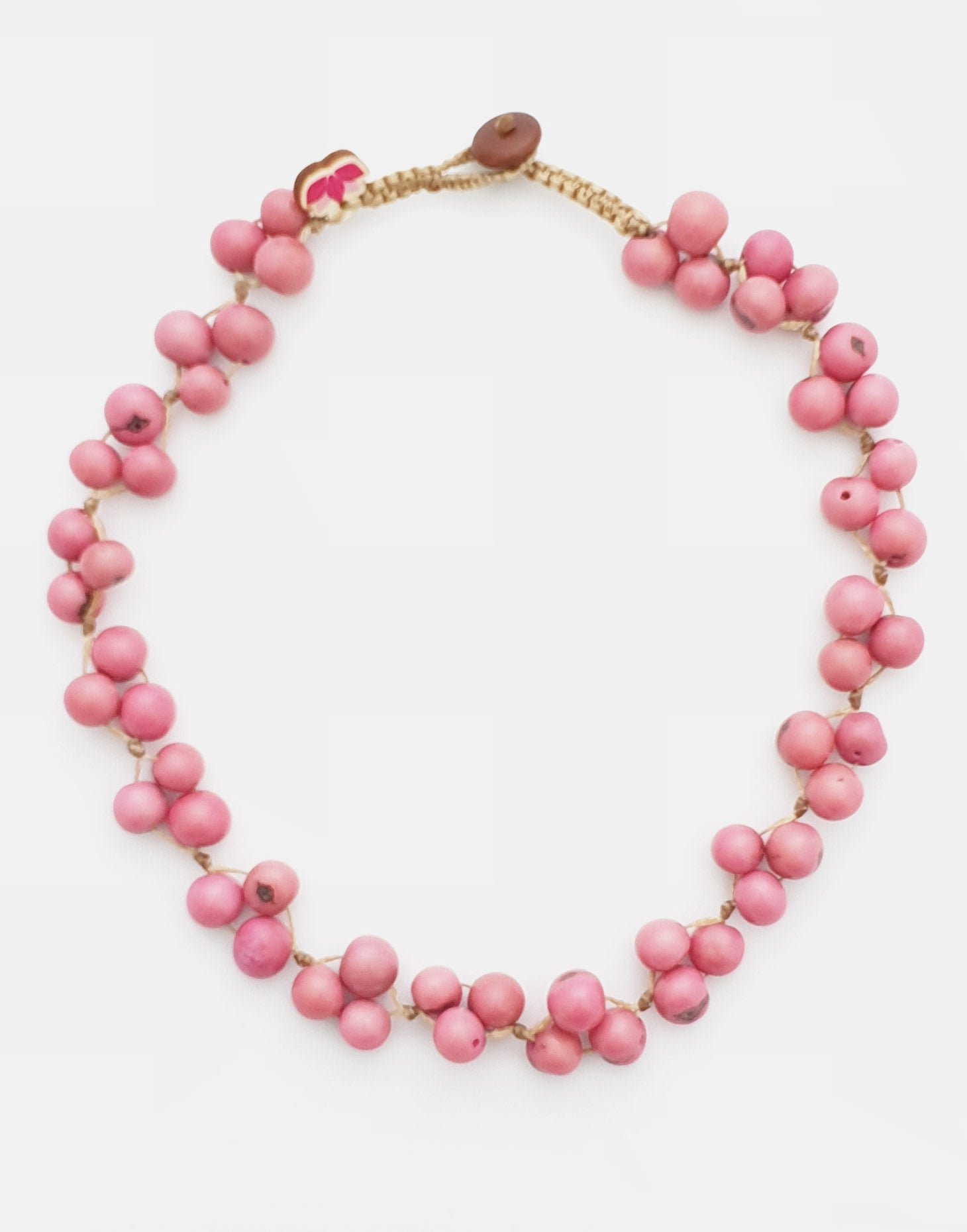 A colorful Acai Berry Short Necklace made from organic acai seeds, showcasing a delicate and lightweight design.