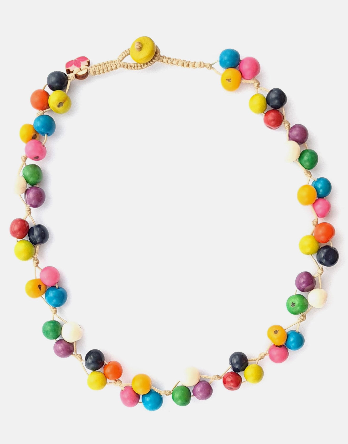 A colorful Acai Berry Short Necklace made from organic acai seeds, showcasing a delicate and lightweight design.