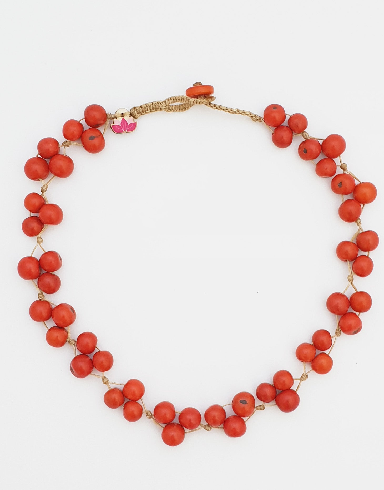 A colorful Acai Berry Short Necklace made from organic acai seeds, showcasing a delicate and lightweight design.