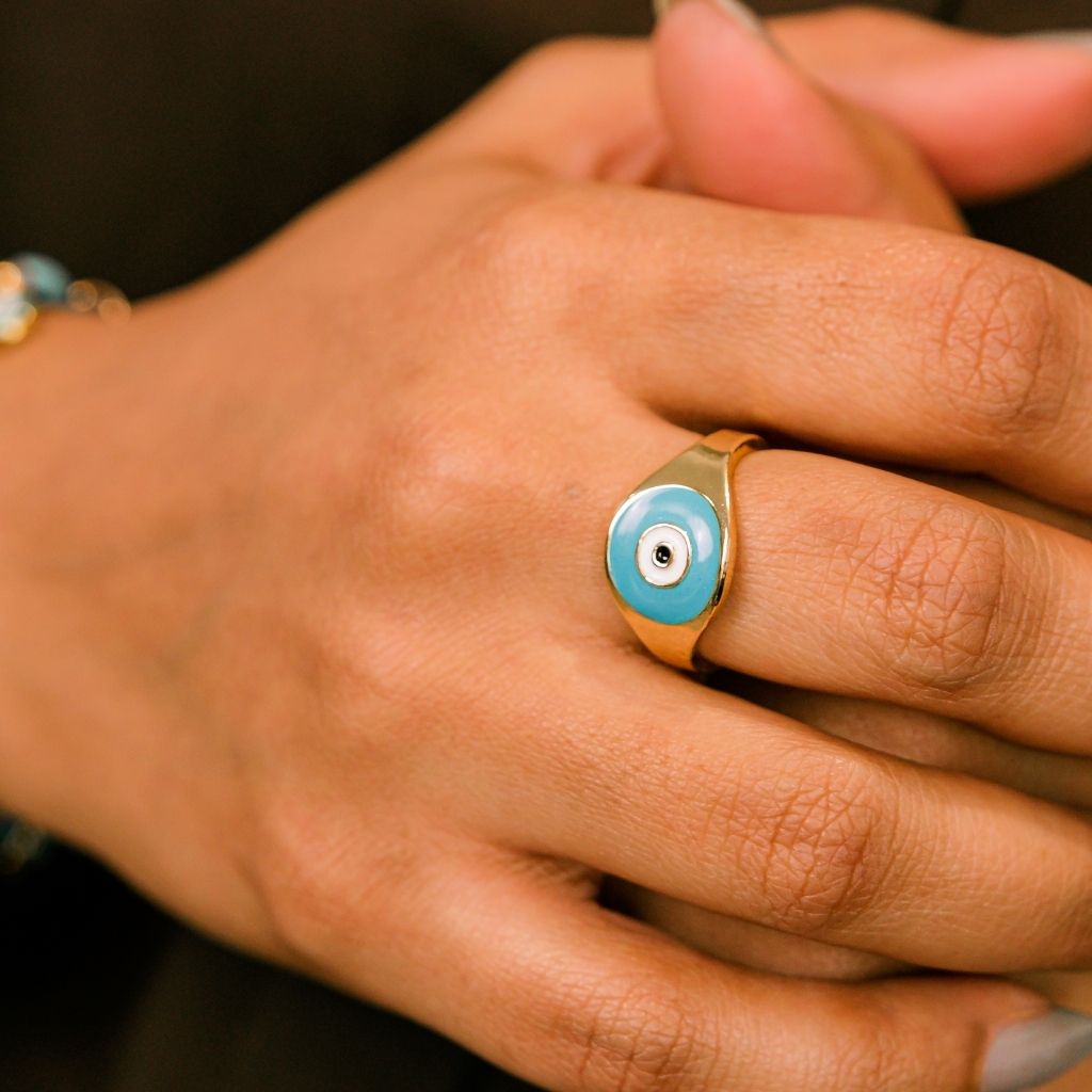 Adjustable Devil Evil Eye Nazaria Ring in blue and white, showcasing a boho chic design made from durable metal alloy.