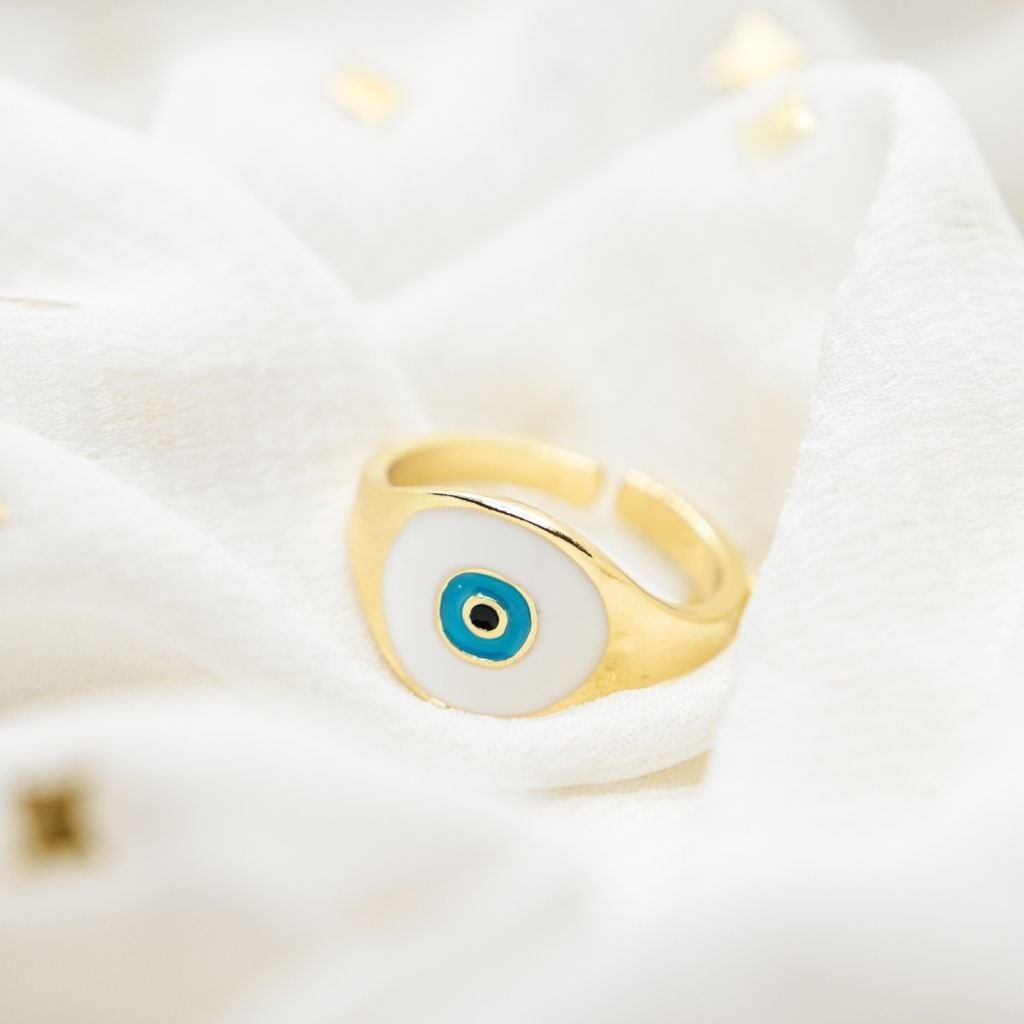 Adjustable Devil Evil Eye Nazaria Ring in blue and white, showcasing a boho chic design made from durable metal alloy.