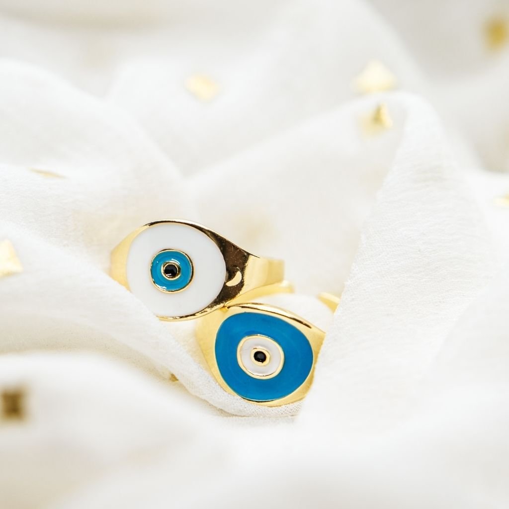 Adjustable Devil Evil Eye Nazaria Ring in blue and white, showcasing a boho chic design made from durable metal alloy.