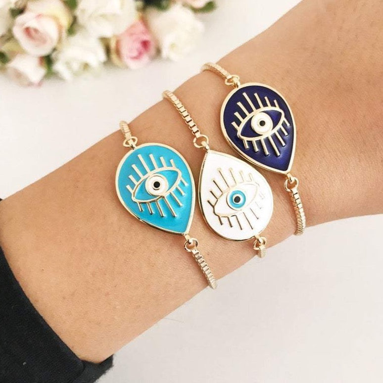 Adjustable Evil Eye Bracelet featuring blue and white evil eye charm on a stainless steel band, showcasing its elegant design and adjustable feature.