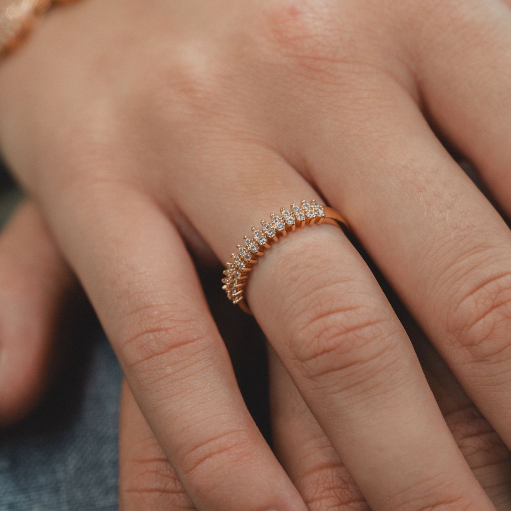 Adjustable Round Rose Gold Elegant Zircon Geometric Stackable Ring showcasing its delicate design and luxurious rose gold finish.