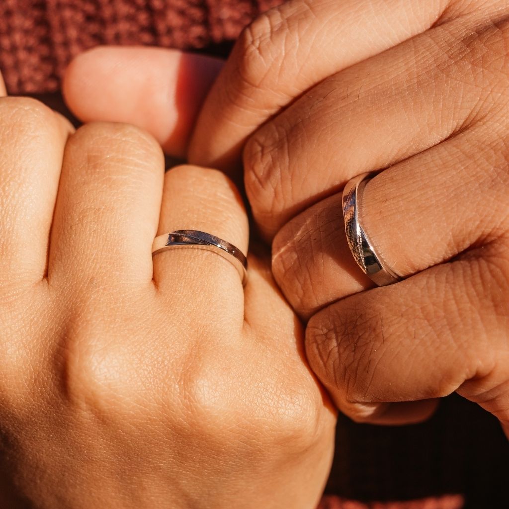 Adjustable Silver Couple Promise Twist Infinity Ring set featuring a contemporary design symbolizing eternal love, crafted from high-quality silver.