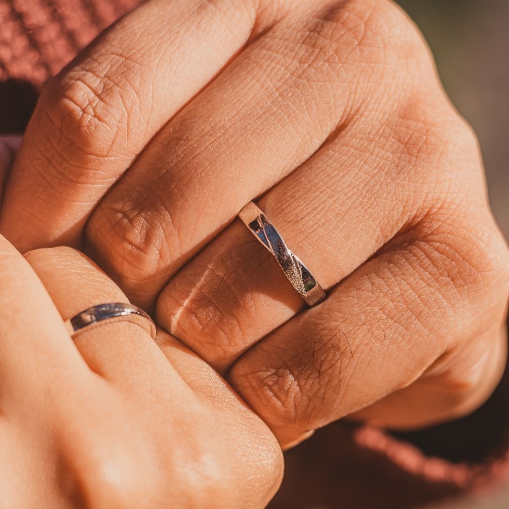 Adjustable Silver Couple Promise Twist Infinity Ring set featuring a contemporary design symbolizing eternal love, crafted from high-quality silver.